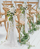 Bröllopsdekor av tyll och blommor