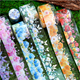Stickers på rulle - Bård - Rosa blommor