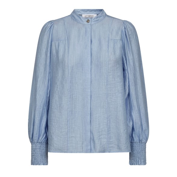 Ljusblå skjorta med smockärmar