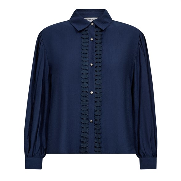 Blus med broderi och silverknappar