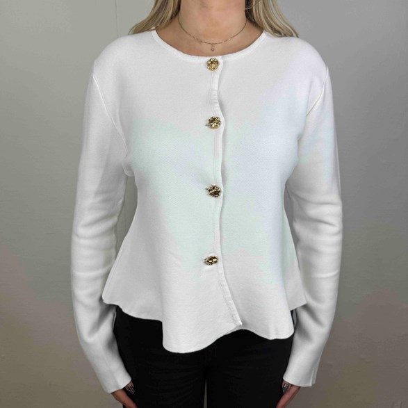 Stickad peplum-kofta med guldknappar