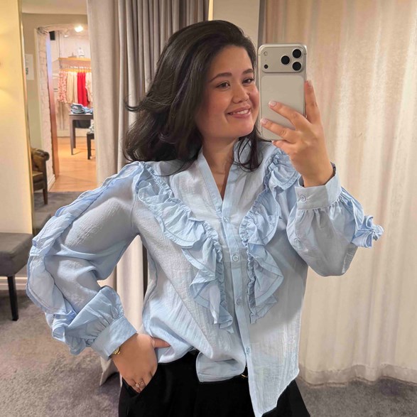 Ljusblå Blus med Volang