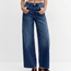Stretchiga jeans med hög midja och vida ben