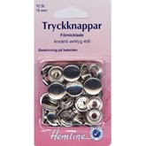 Tryckknappar silverfärgade