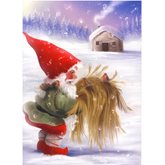 Tomte framför stuga med kärve