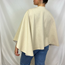 Trendig poncho