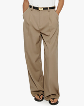 Teurn Studios Relaxed-Fit Pleated Trousers Beige