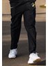 NIKE TRVL PANTS 26 - HERR