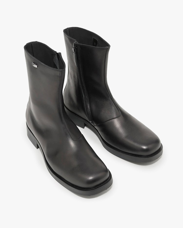 our-legacy-camion-boot-black.jpeg