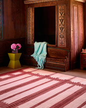 Layered Röllakan Wool Rug Iris Raspberry