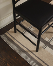 Layered Röllakan Ruth Wool Rug Almond